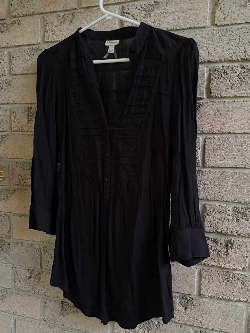 Black dynamite blouse with lace trim